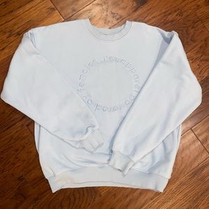 embroidered, vintage -looking sweatshirt